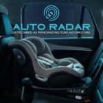 cadeirinha de bebê dentro de um automóvel, virada de costas para o banco do motorista